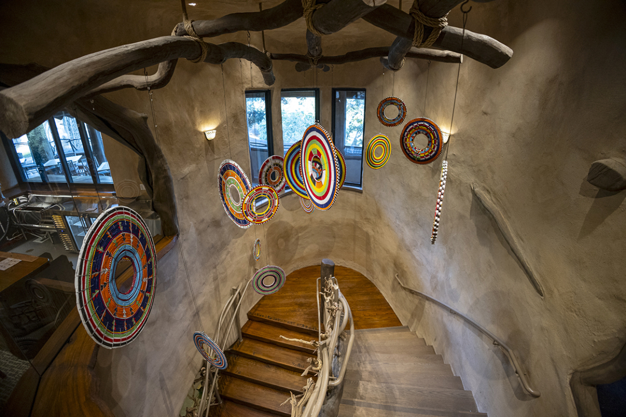 Mkutano House staircase with chandelier